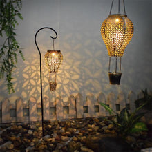Load image into Gallery viewer, Wrought Iron Hollow Solar Garden Light